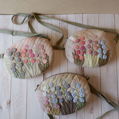 QB47 TÚI PHỒNG TRÒN HOA 3D